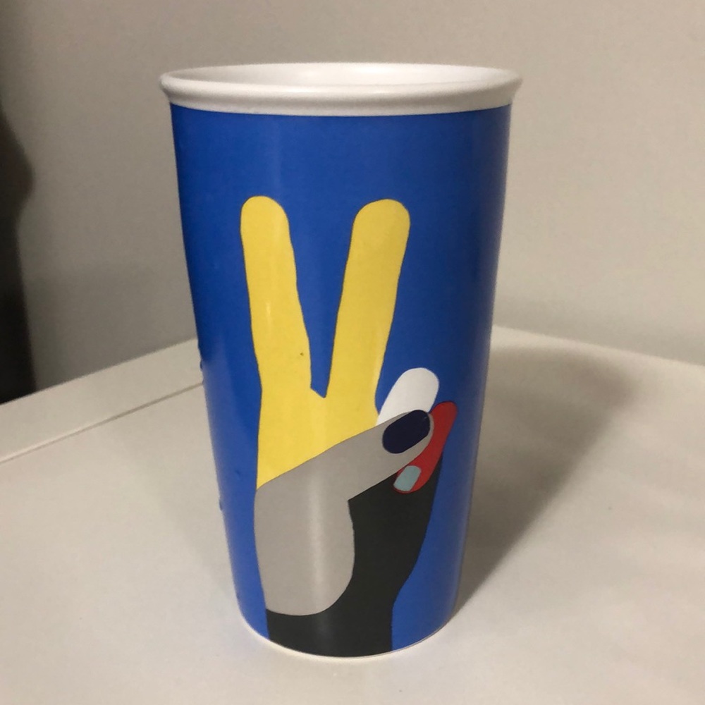 Starbucks ceramic “ peace “ mug. 12 fl ounces / 355 ml. No lid.